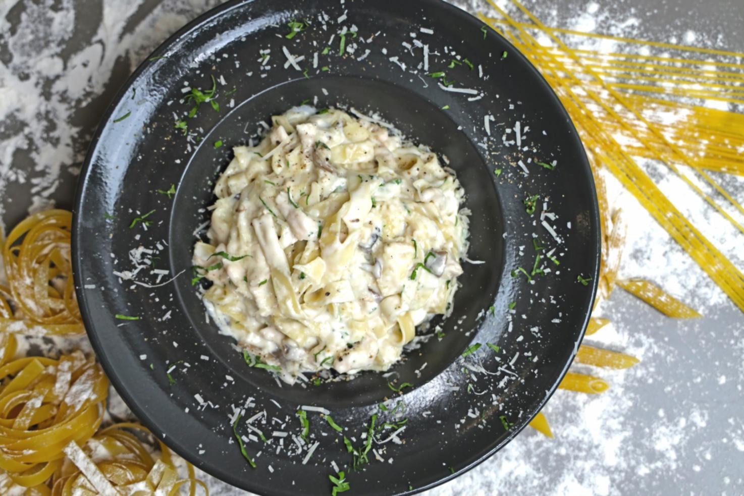 Seasonal cooking ingredients laid out on a kitchen surface, showing fresh produce and dough preparation